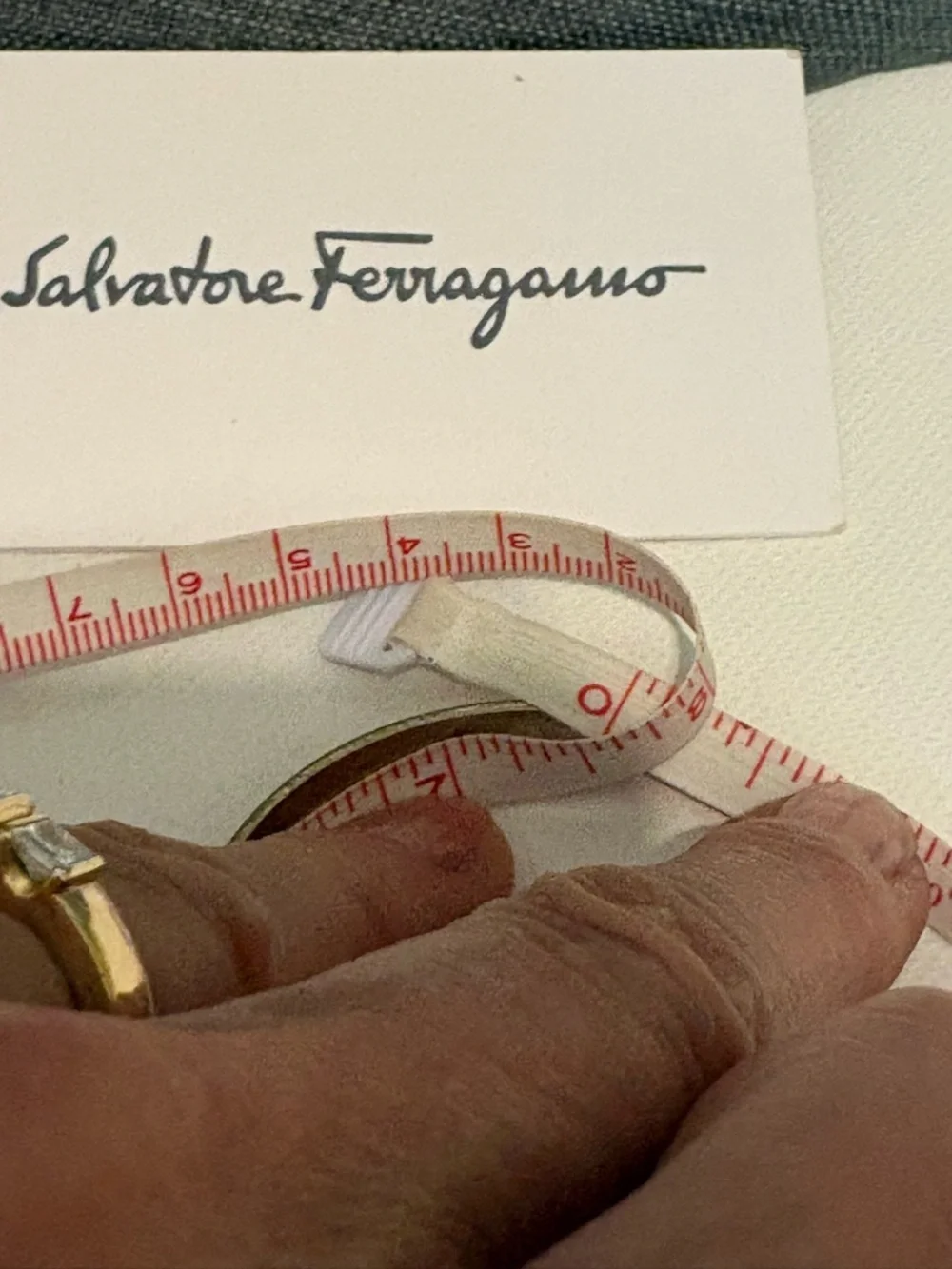 Authentic Salvatore Ferragamo charm set on unbranded bangle bracelet